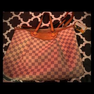 Louis Vuitton Siracusa bag